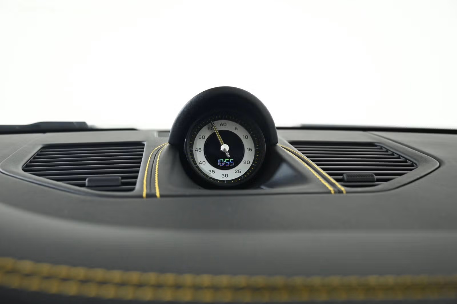 Chrono stopwatch dial in white on dashboard