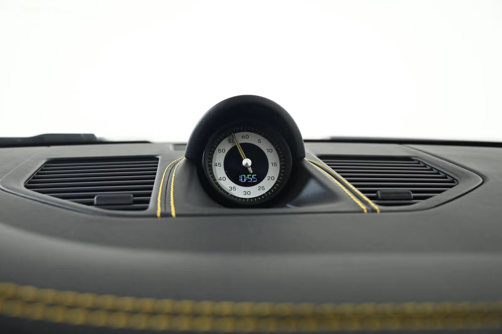 Chrono stopwatch dial in white on dashboard