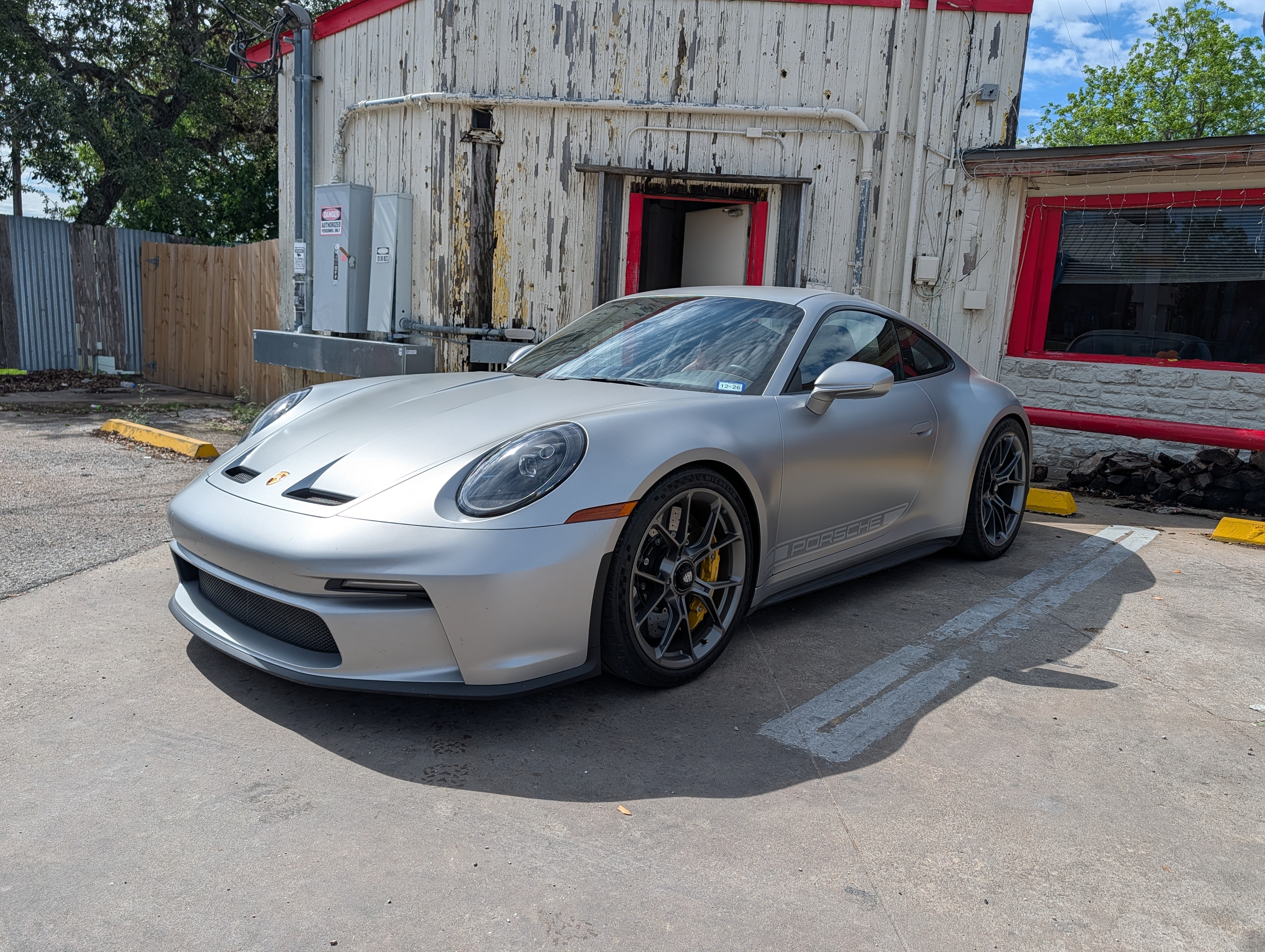 Front three-quarter, parking lot, daylight