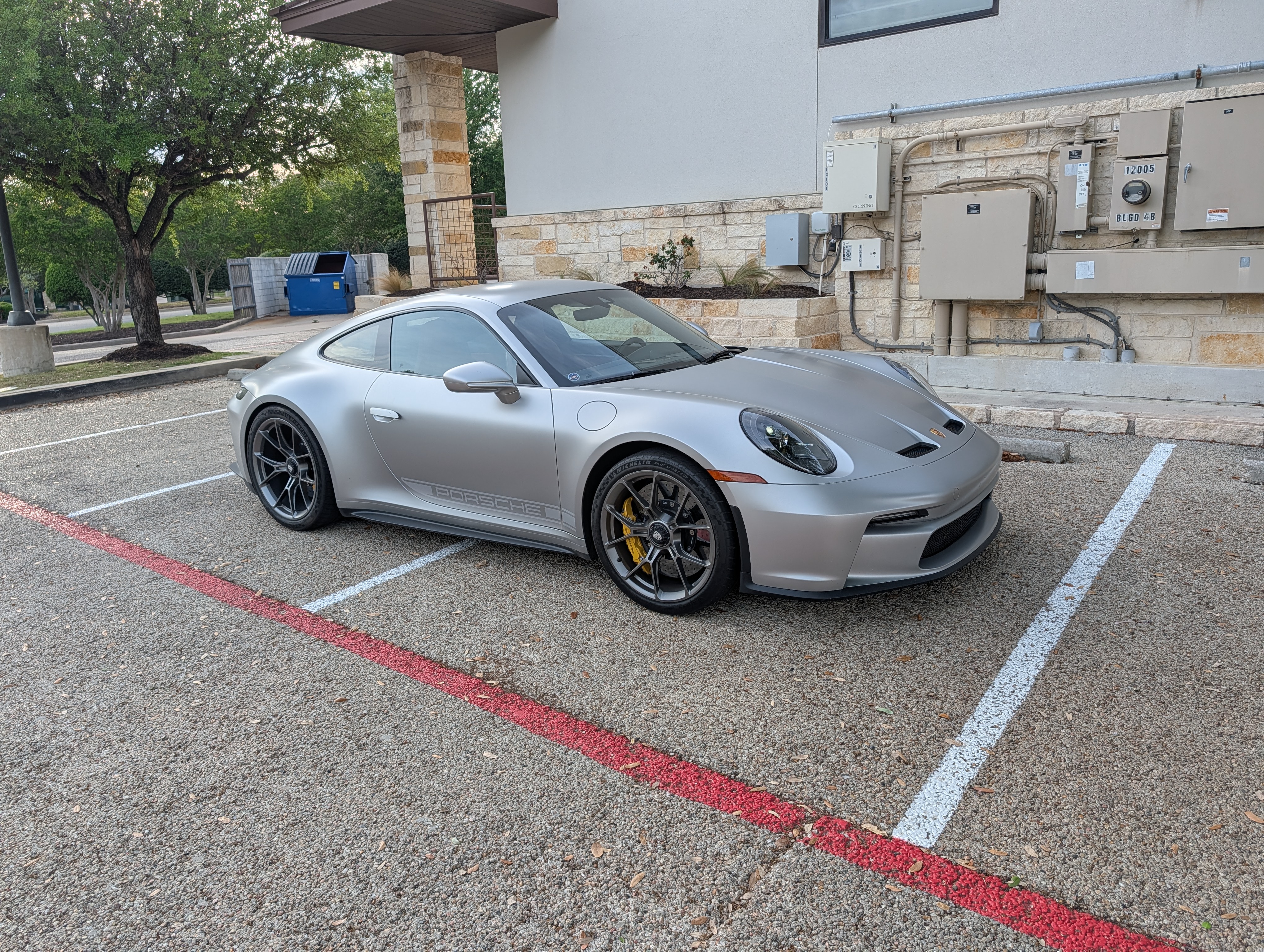 Front three-quarter, parking lot, evening light