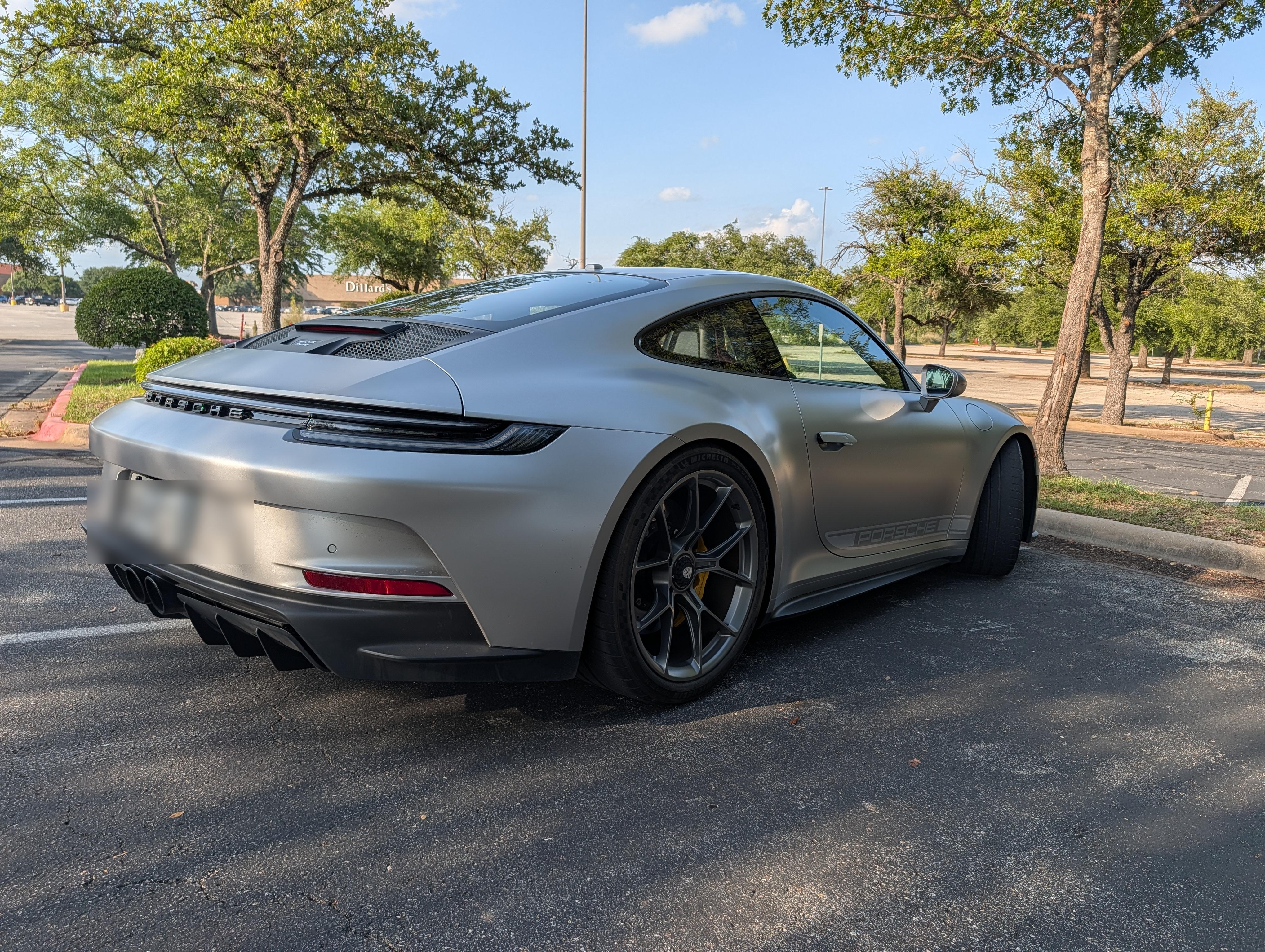 Rear three-quarter, parking lot