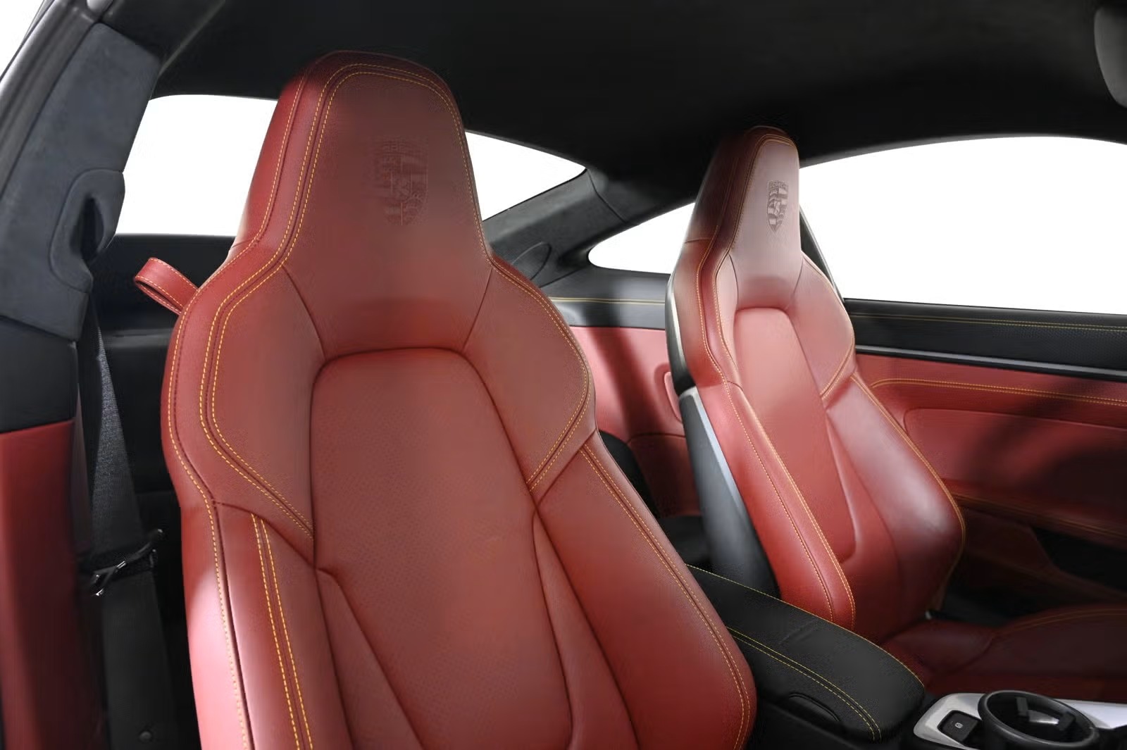 Front seats, alternate angle, embossed Porsche crest