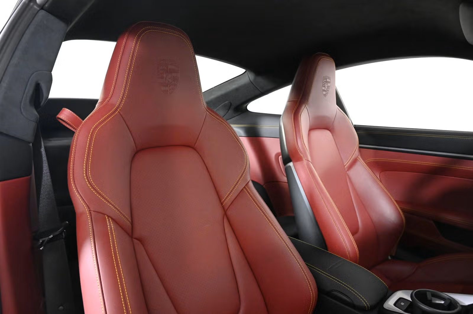 Front seats, alternate angle, embossed Porsche crest