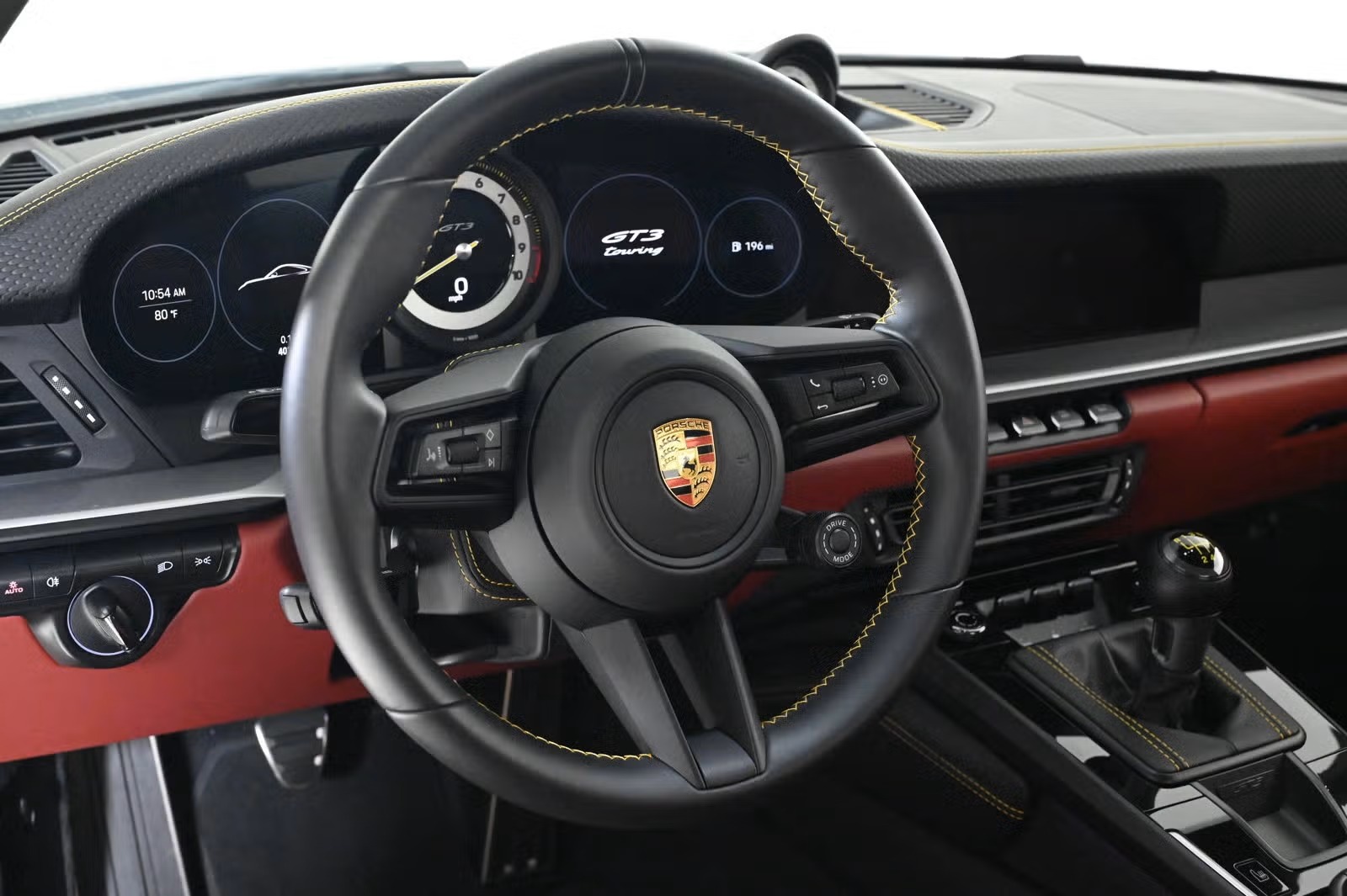 Steering wheel with GT3 Touring script and yellow stitching
