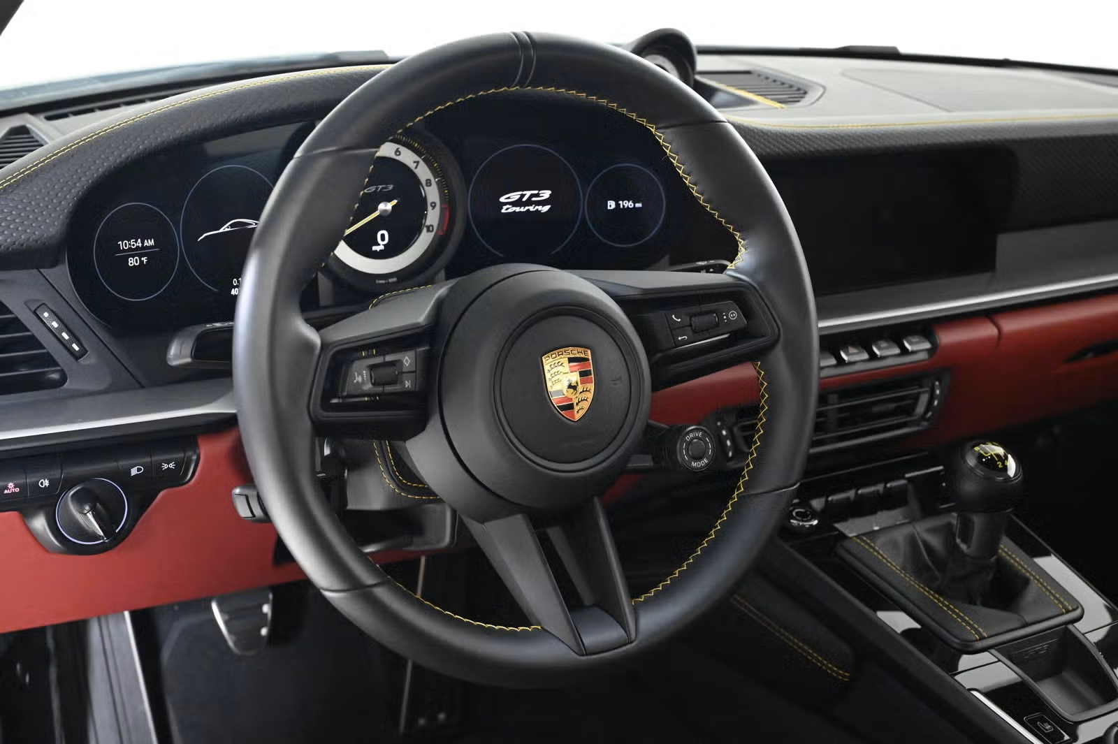 Steering wheel with GT3 Touring script and yellow stitching